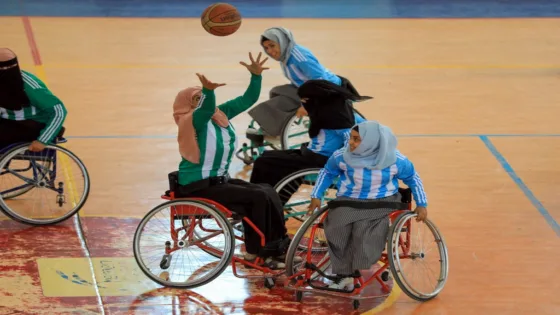 Disabled Yemeni women take part in a local wheelchair basketball championship in Yemen's capital Sanaa on December 8, 2020. - In conflict-ridden Yemen, nine teams, including five-all women groups, competed in a local championship for the disabled in the capital Sanaa, which has been under rebel control since 2014. The players are competing to be embraced by society for their strengths rather than be viewed as a burden during the time of war. (Photo by Mohammed HUWAIS / AFP)